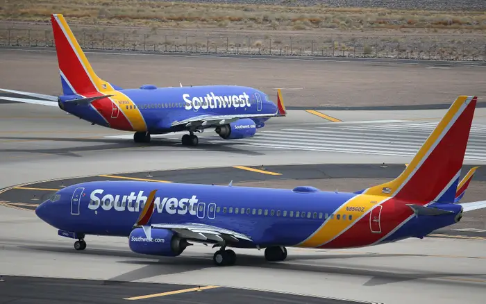 Use your Southwest Rapid Rewards Priority Card to get flights for free...well almost free.